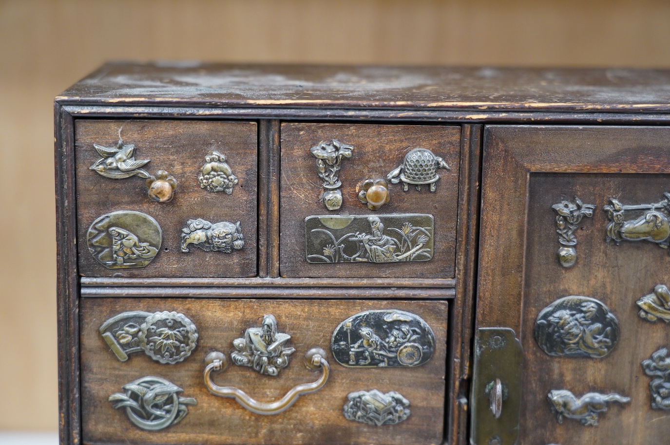 A late 19th century Japanese desk top dansu cabinet, 33.5x 29cm. Condition - fair